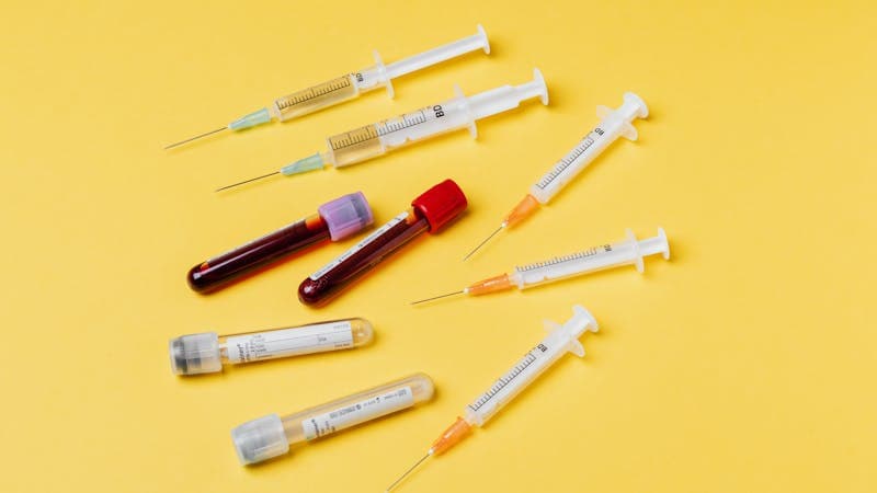 Syringes and vials representing the Peptide Calculator tool